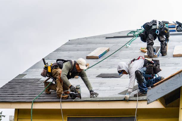 Professional Roofing technician working in Adamsville, RI
